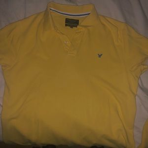 Selling yellow American eagle shirt.